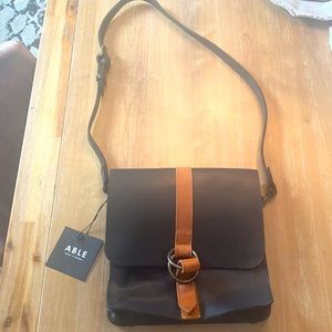 Classic leather slim crossbody bag.